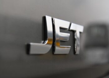 JET to Reduce Carbon Emission with Electric Vehicles